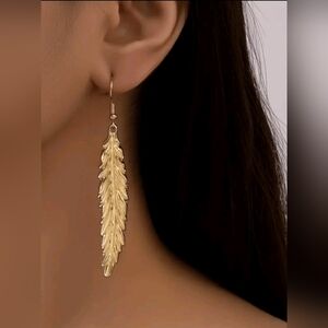 Gold Feather Dangle Earrings with Intricate Detailing